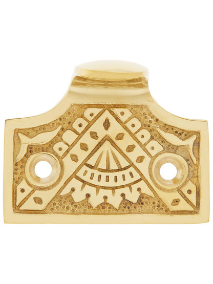 Cast Brass Oriental Pattern Sash Lift In Unlacquered Brass Finish.